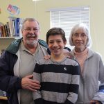 A Room 8 student with his grandparents