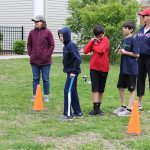 A Room 5 student gets ready for his timed sprint during field day