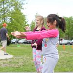 Room 2 students take part in a water balloon toss