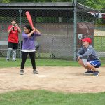 Wolf student steps to the plate during the field day wiffle ball game