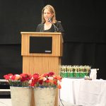 Meg Sutton announces this year's yearbook dedication