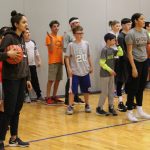 Brown Women's Basketball Team players lead a warm up drill
